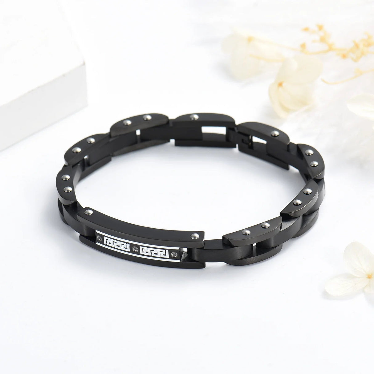 Black chain link cremation bracelet with secure ash chamber