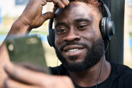 man listening to a song remembering someone who passed