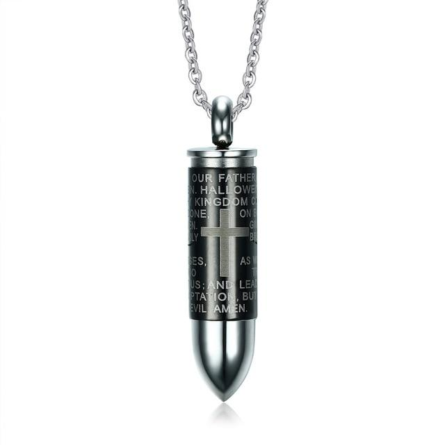 Bullet shaped cremation urn necklace with a cross and the lord's prayer engraved on it