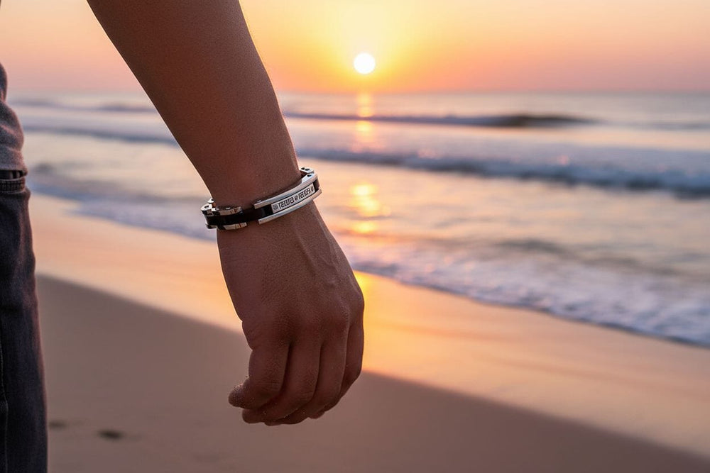 Chain link cremation bracelet worn on a man's wrist