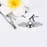 Cremation Necklace - Skull With Wings Cremation Urn Necklace